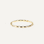 Gold filled ring on a white background