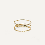 Gold filled ring with a twisted design on a white background
