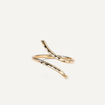 Gold filled ring with a modern design on a light beige background