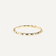 Gold filled ring on a white background