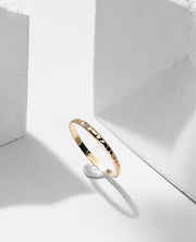 Gold filled ring on a white background