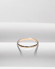 Gold filled ring on a white cloth