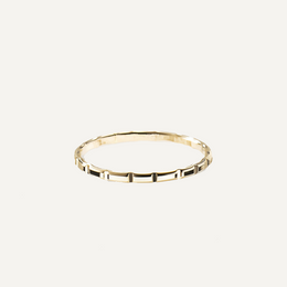 Gold ring on a white background