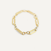 Gold filled chain ring on a white background